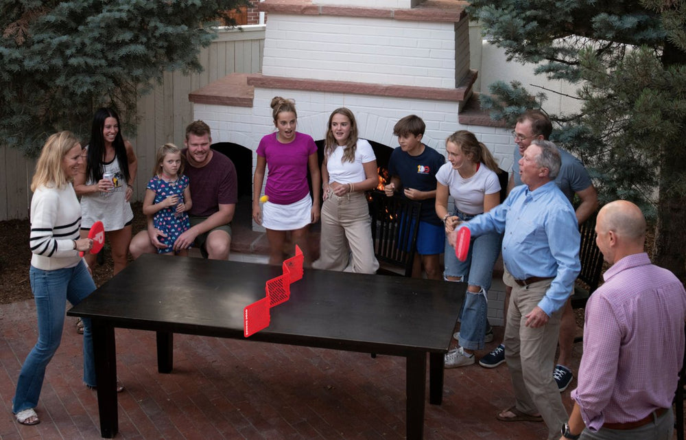 5. What starts as a kids' game pulls everyone in, including people who didn't plan to play